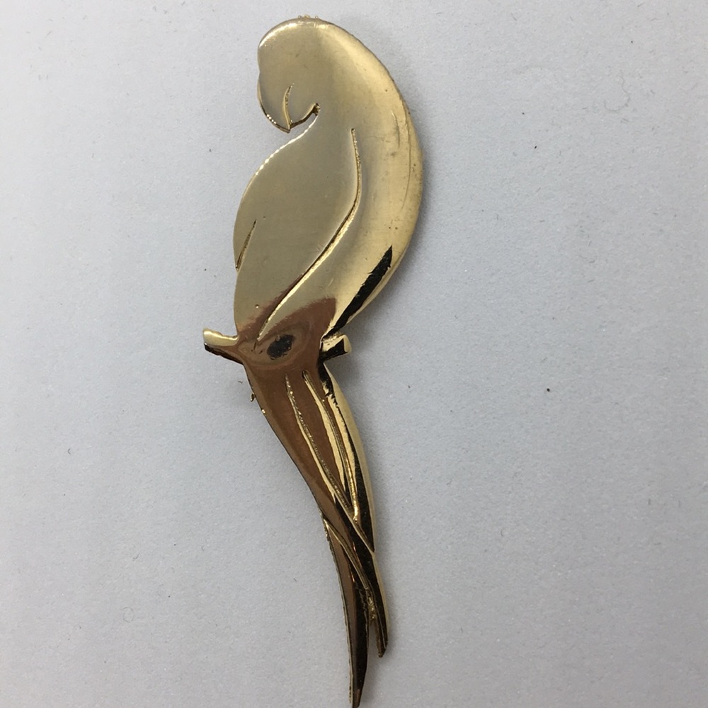 Gold tone parrot pin